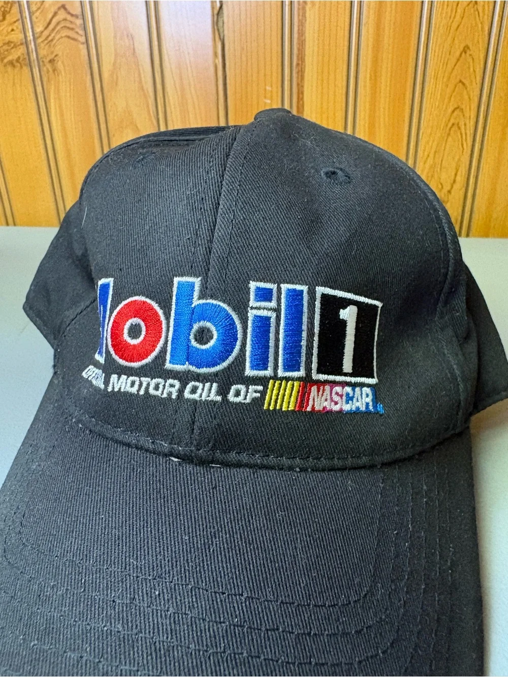 Chase Authentics Black Baseball Cap with Blue, Red and White Mobil 1 Logo